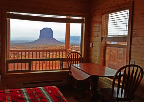 MV Cabins a dining room table in front of a window